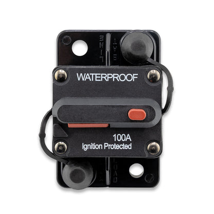 A black 100 Amp waterproof circuit breaker with a red switch, labeled 'Ignition Protected'.