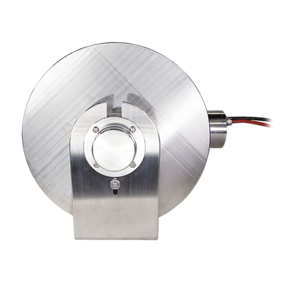 A stainless steel anchor winch with a motor and drum designed for use with small recreational boats or commercial vessels.