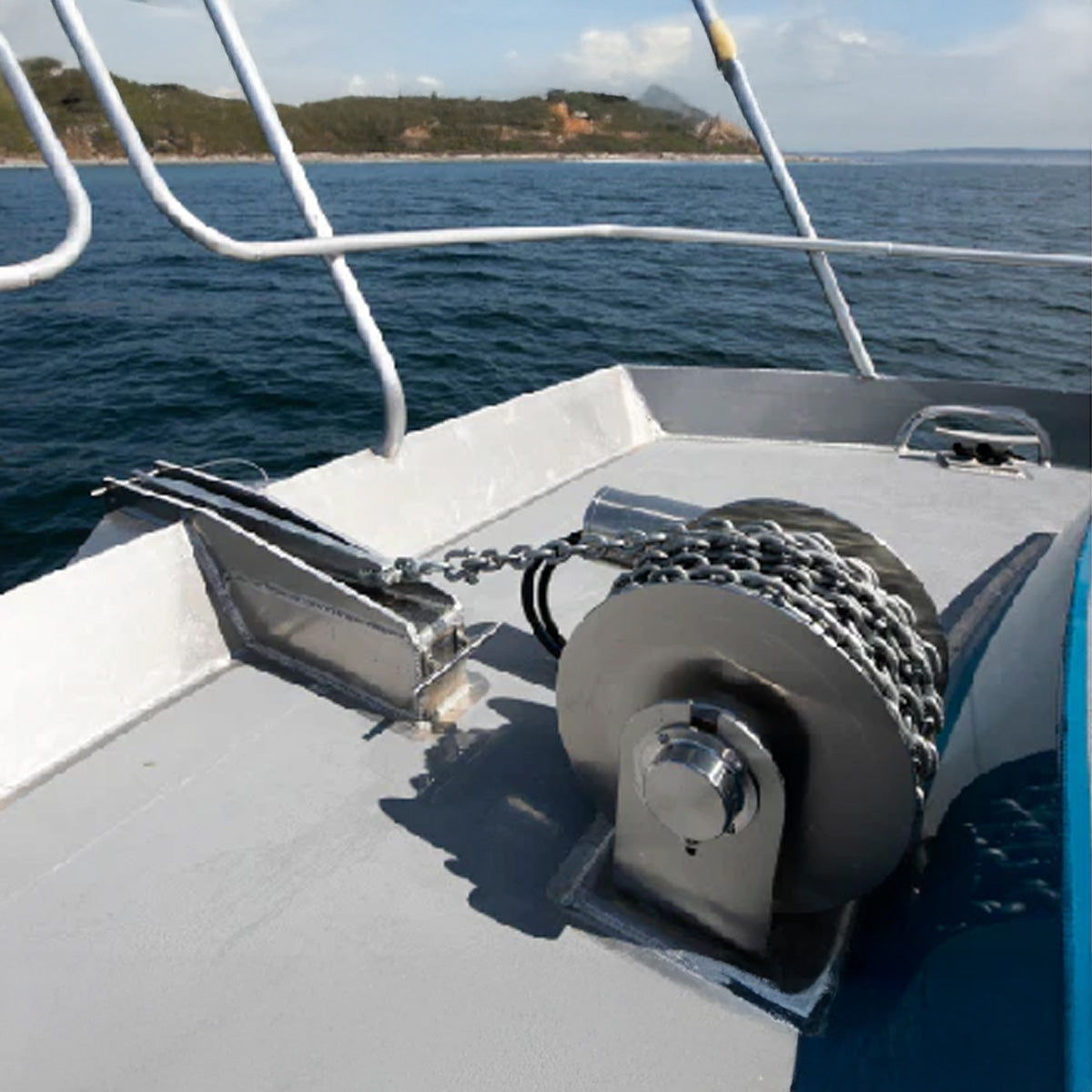 Boat winch on a boat with water and sky in the background