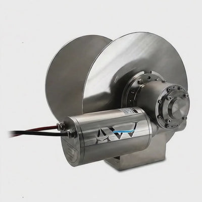 A stainless steel anchor winch with a motor and drum designed for use with small recreational boats or commercial vessels.